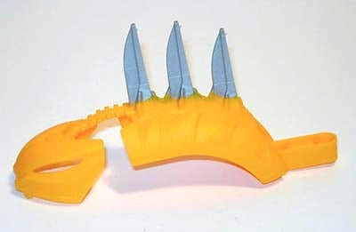 Yellow LEGO Bionicle Rahkshi back cover, Stars Series, with attached mask and three molded pearl light gray blades.