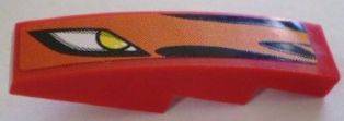 Red LEGO curved 4x1 slope with an orange sticker featuring a stylized yellow eye and black flames pattern.