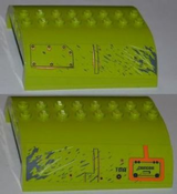 Two views of a lime green LEGO 8x8x2 double curved slope brick with grey distressed effects, bolted panel, 'TMA', and 'DANGER' pattern.