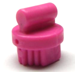 Close-up of a small, round, bright pink LEGO Friends brush accessory with a ridged base and a smooth handle.