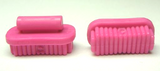 Two pink LEGO Friends 92355i large oval brushes with bristles, one with an attached handle piece.
