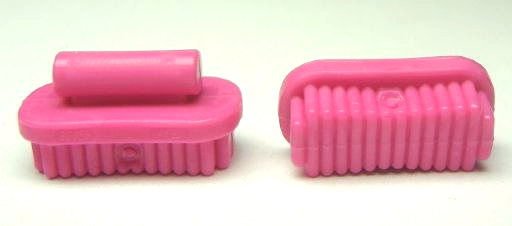 Two pink LEGO Friends 92355i large oval brushes with bristles, one with an attached handle piece.