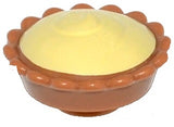 LEGO pie with a brown crust and bright light yellow cream filling, featuring a scalloped edge.