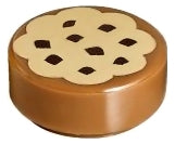 LEGO 98138pb014 round 1x1 tile featuring a cookie pattern with tan frosting and reddish-brown chocolate sprinkles.