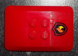 Red LEGO 6x4x2/3 wedge with four visible studs and a transparent sticker featuring a black and yellow fire logo badge.