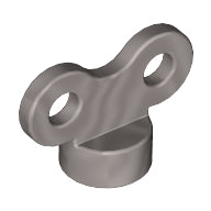 A metallic silver LEGO minifigure utensil toy winder key with two circular holes and a round base.