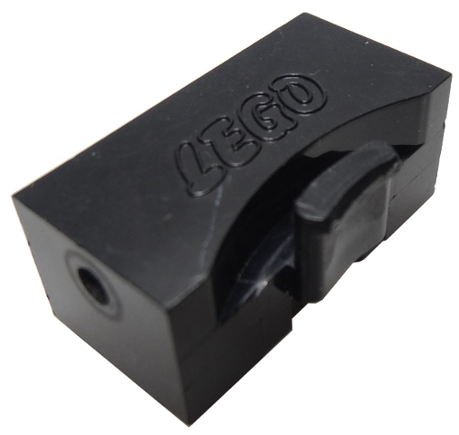 Black LEGO Train Brick 2x4x1 1/3 Sliding Block with Wheels Holder, Type b with Ledge, embossed LEGO logo on top.