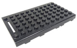 Black LEGO bb0044c Electric 4.5V Battery Box, 6x11 Type III, with studs and a white slot on the left.