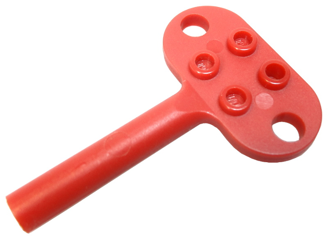 Red LEGO bb0047 windup motor 1980s key with four studs and two holes on a white background.