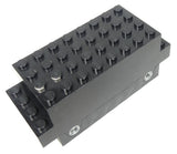 A black LEGO 9V electric motor, part bb0129, 4x10x3 1/3, with visible studs and two light grey axle holes on its side.