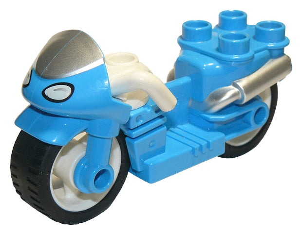 Blue LEGO Duplo motorcycle with rubber wheels, white handlebars, grey windscreen, and printed headlights.