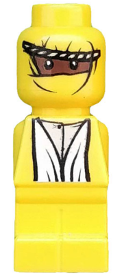 Yellow LEGO microfigure (85863pb006) with a brown bandana eye mask, smiling face, and white V-neck adventurer shirt.