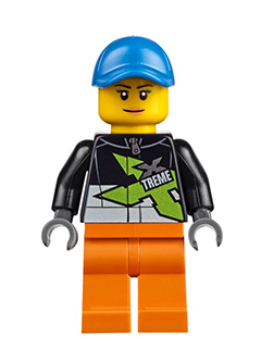 Female LEGO minifigure wearing a blue cap, a black racing jacket with green 'XTREME' logo, and orange pants.