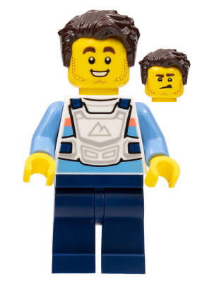 LEGO Minifigure with dark brown hair, smiling yellow face (alternate annoyed face shown), white vest, light blue shirt, dark blue pants.
