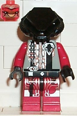 A red LEGO Zotaxian Alien minifigure with a black helmet, grey patterned torso, and red patterned legs. An alien head is shown.
