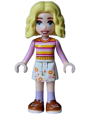 Full shot of LEGO Minifigure wed003 Enid Sinclair with blonde curly hair, bright pink striped sweater, and floral skirt.