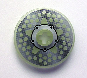LEGO Technic Disk 3x3, light green, with a silver disk brake hub and black bolts pattern.