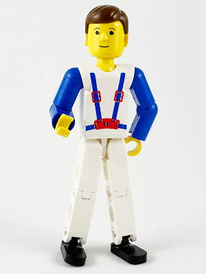 LEGO Technic figure tech006 with white top, blue arms, white legs, yellow head, brown hair, and blue suspenders pattern.