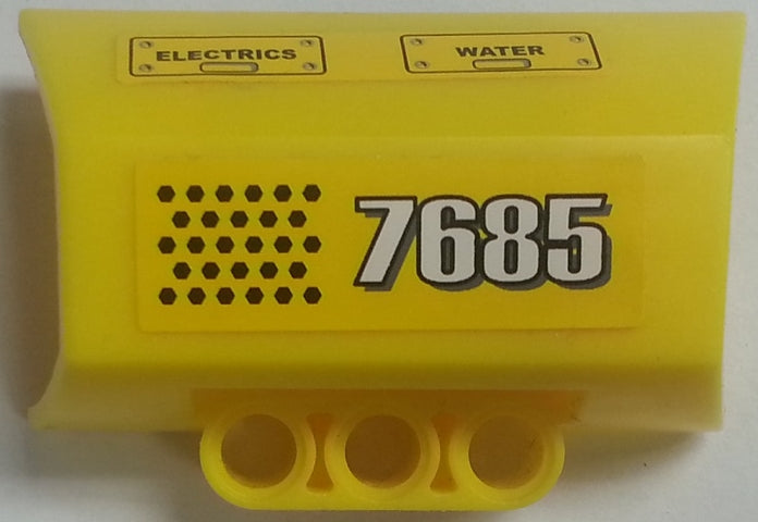 Yellow LEGO Technic engine block panel with '7685', 'ELECTRICS', 'WATER', and hexagon sticker. Part 61069pb006R.
