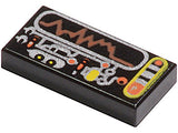 Black LEGO 1x2 tile with silver, orange, and yellow circuitry print, including a display showing a brown wavy line.