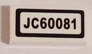A close-up of a white LEGO 1x2 tile with a black-bordered sticker displaying 'JC60081' in black text.