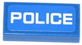 Blue LEGO 1x2 tile with a white 'POLICE' thin font sticker. Used in LEGO Sets 60041 and 60047.