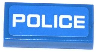 Blue LEGO 1x2 tile with a white 'POLICE' thin font sticker. Used in LEGO Sets 60041 and 60047.