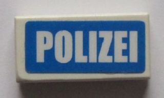 White LEGO 1x2 tile with 'POLIZEI' in white on a blue rectangular background.