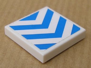 White LEGO 2x2 tile with blue chevron stripes on a white background.