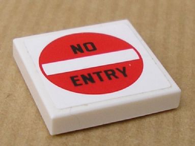 White LEGO 2x2 tile featuring a red circular 'NO ENTRY' sign pattern, likely a sticker, on a brown background.