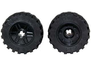 Two black LEGO wheels (part 55982c05 / 92402) with 18mm diameter, axle hole, fake bolts, shallow spokes, and offset tread.