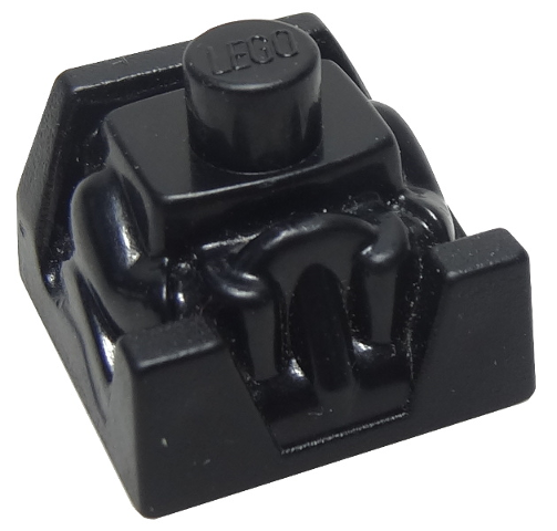 A black LEGO x351 Racers Driver body piece, featuring a single stud with 'LEGO' on top, molded arms, and a recessed base.